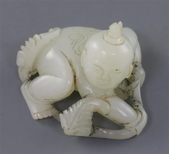 A Chinese white jade figure of a boy, 19th century, 5.5cm
